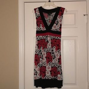 Sleeveless red, black, and white flower dress